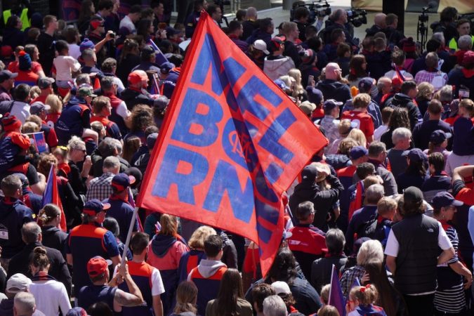 A sea of red-and-blue attired Melbourne Demons fans in Perth's CBD.