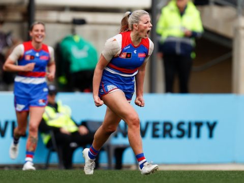 Gabby Newton screams with delight after kicking a goal
