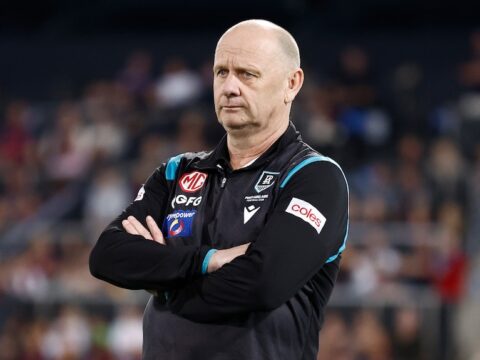 Port Adelaide coach Ken Hinkley with his arms folded.